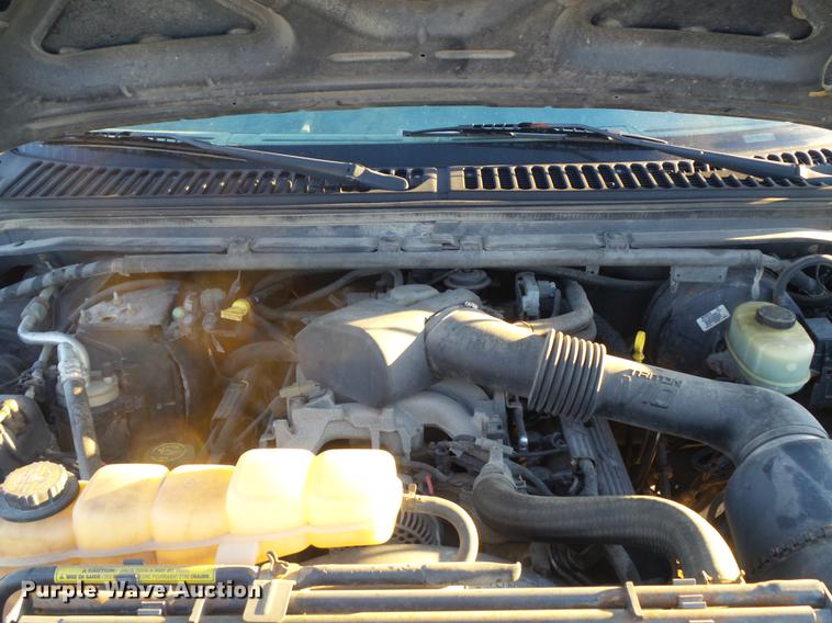 image for item DC7494 1999 Ford F350 Super Duty XLT Crew Cab utility bed pickup truck