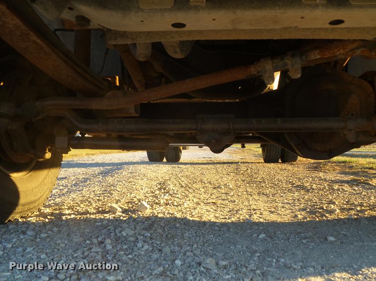 image for item DC7494 1999 Ford F350 Super Duty XLT Crew Cab utility bed pickup truck