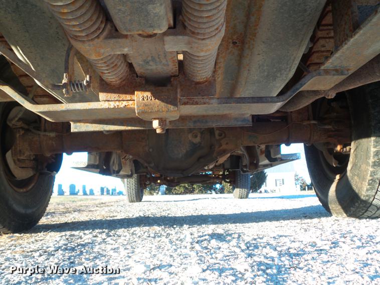 image for item DC7494 1999 Ford F350 Super Duty XLT Crew Cab utility bed pickup truck