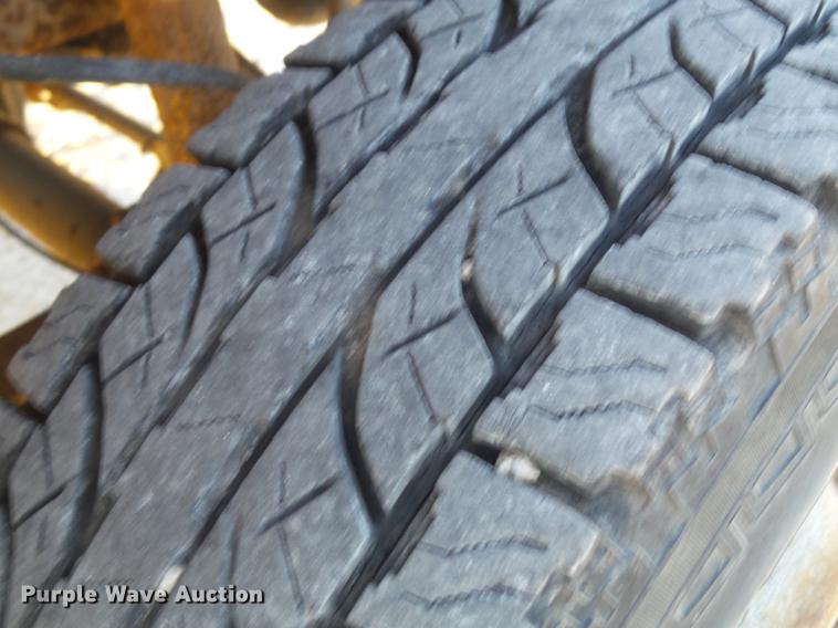 image for item DC7494 1999 Ford F350 Super Duty XLT Crew Cab utility bed pickup truck