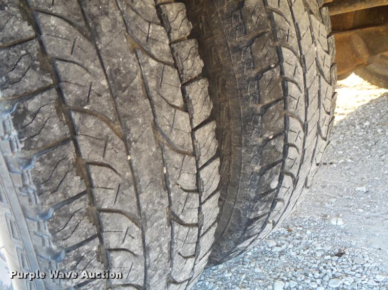 image for item DC7494 1999 Ford F350 Super Duty XLT Crew Cab utility bed pickup truck