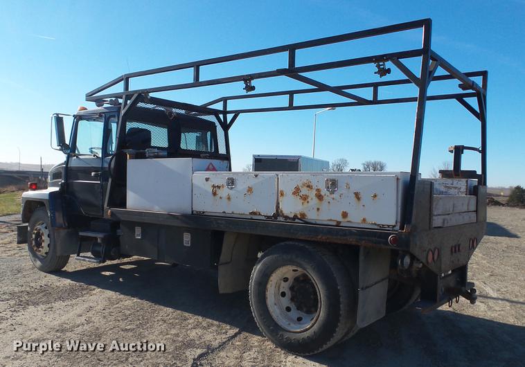 image for item EE9328 1997 Mack CS200P flatbed truck