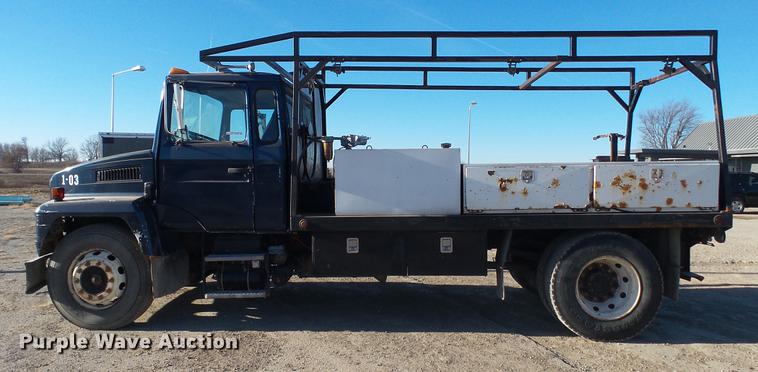 image for item EE9328 1997 Mack CS200P flatbed truck