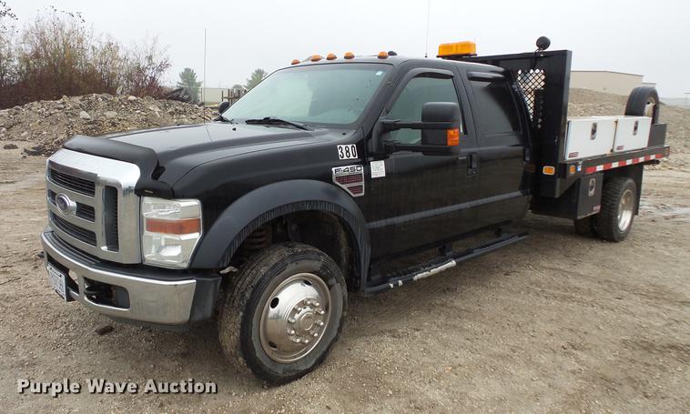 image for item DC6381 2008 Ford F450 Super Duty Crew Cab flatbed pickup truck