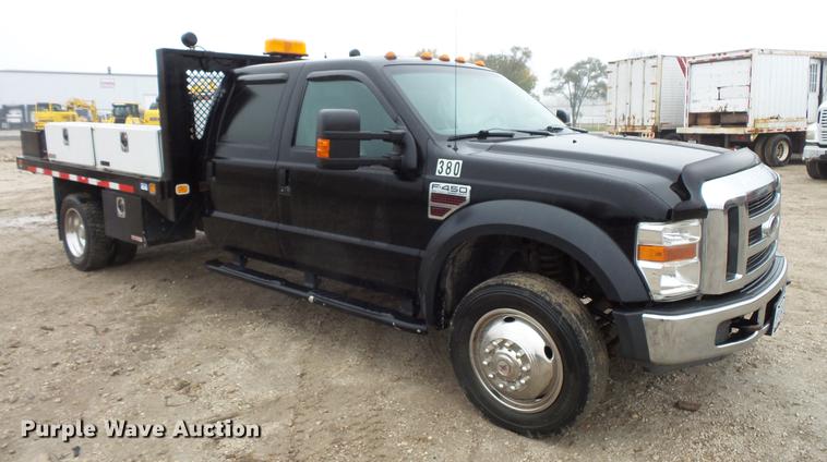 image for item DC6381 2008 Ford F450 Super Duty Crew Cab flatbed pickup truck