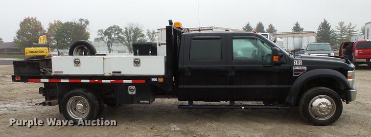 image for item DC6381 2008 Ford F450 Super Duty Crew Cab flatbed pickup truck