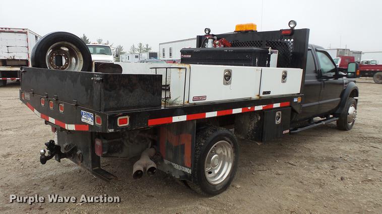 image for item DC6381 2008 Ford F450 Super Duty Crew Cab flatbed pickup truck