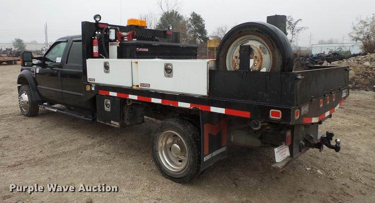 image for item DC6381 2008 Ford F450 Super Duty Crew Cab flatbed pickup truck