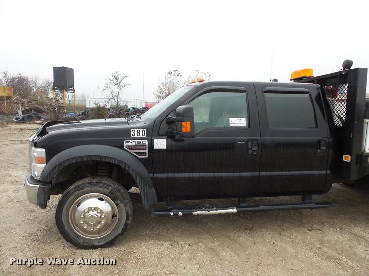 image for item DC6381 2008 Ford F450 Super Duty Crew Cab flatbed pickup truck