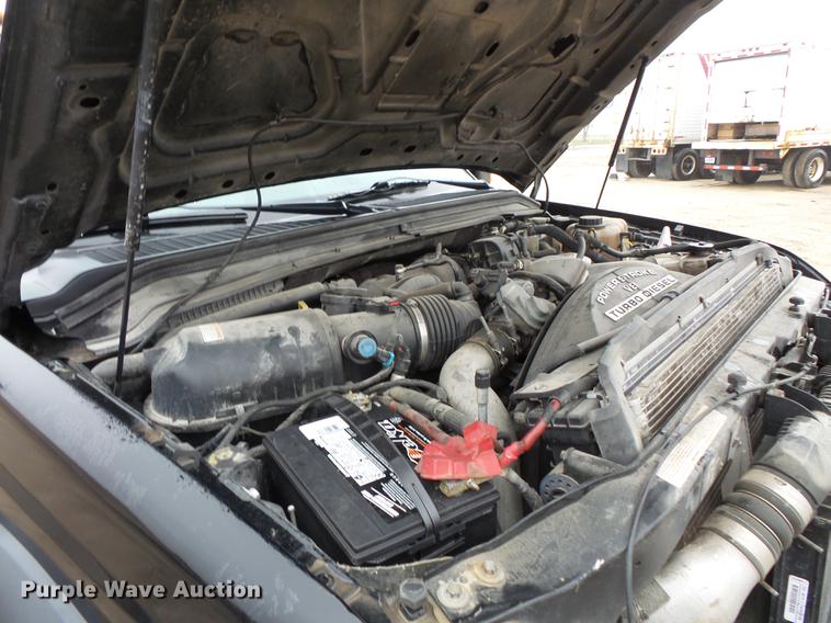 image for item DC6381 2008 Ford F450 Super Duty Crew Cab flatbed pickup truck