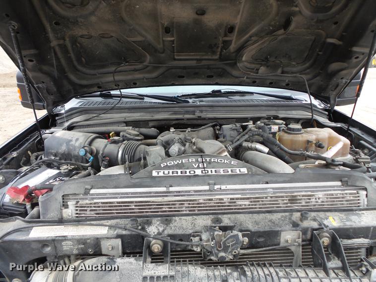 image for item DC6381 2008 Ford F450 Super Duty Crew Cab flatbed pickup truck