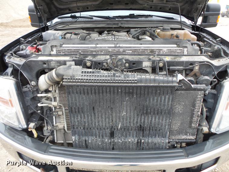 image for item DC6381 2008 Ford F450 Super Duty Crew Cab flatbed pickup truck