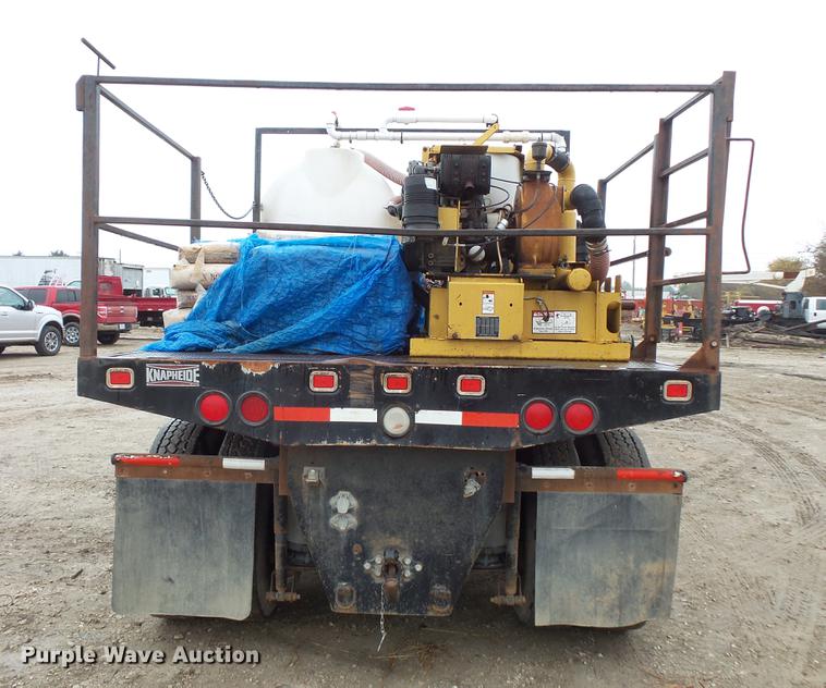 image for item DC6385 2002 Mack CH613 flatbed truck with mud mixer