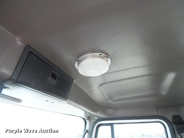 image for item DC6385 2002 Mack CH613 flatbed truck with mud mixer