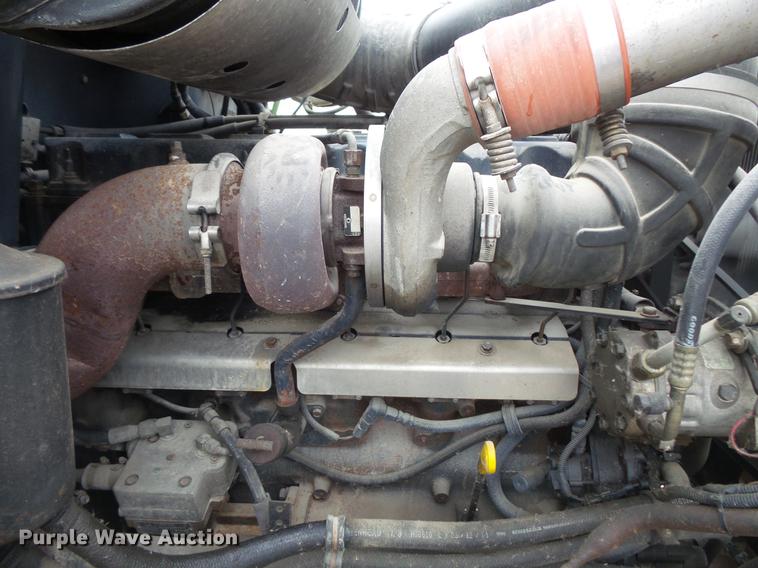 image for item DC6385 2002 Mack CH613 flatbed truck with mud mixer