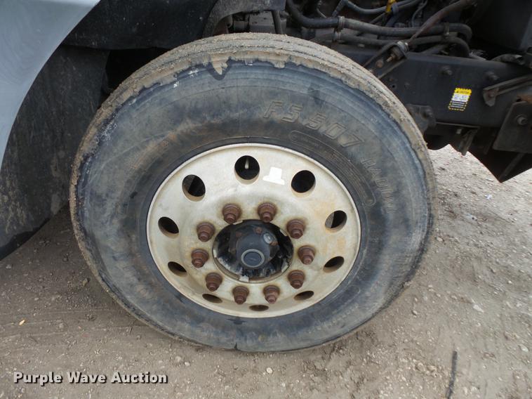 image for item DC6385 2002 Mack CH613 flatbed truck with mud mixer