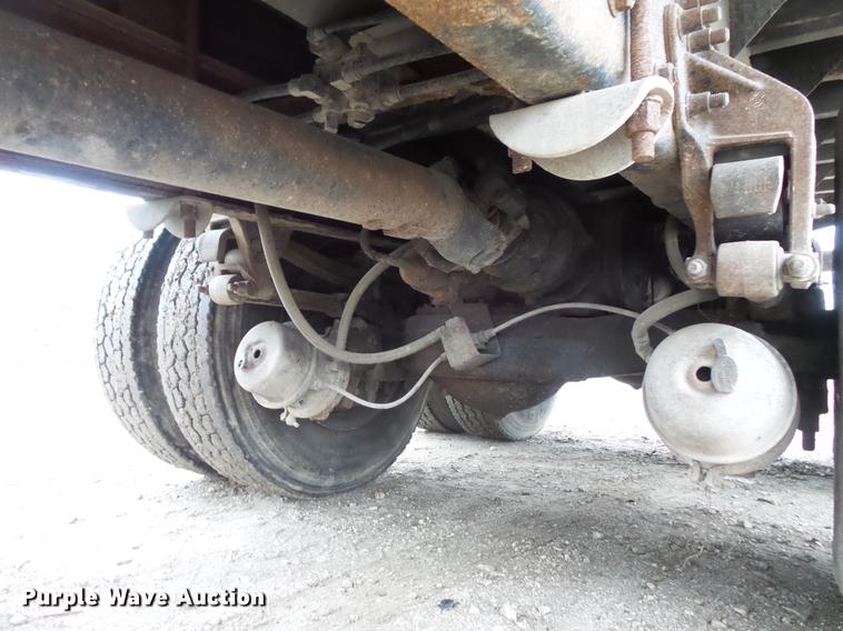 image for item DC6385 2002 Mack CH613 flatbed truck with mud mixer