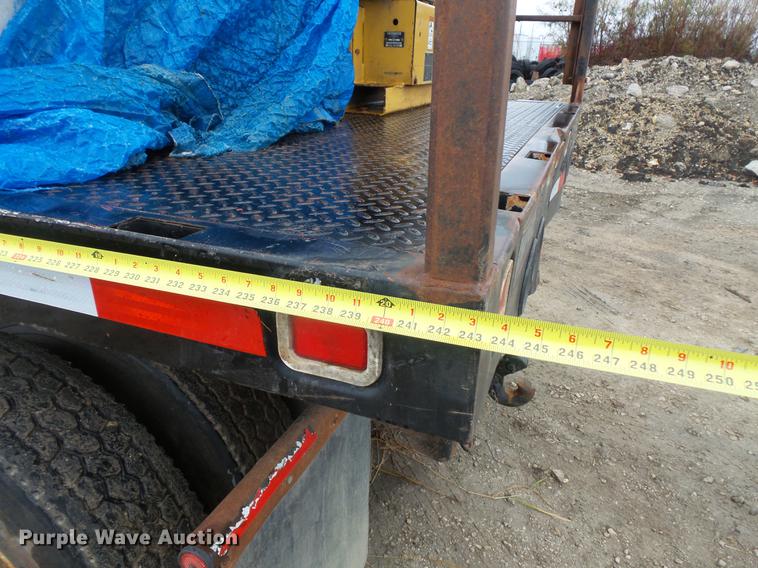 image for item DC6385 2002 Mack CH613 flatbed truck with mud mixer