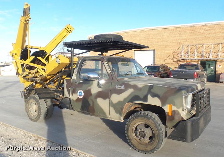image for item DC1943 1977 Chevrolet 30 pickup truck with tree spade