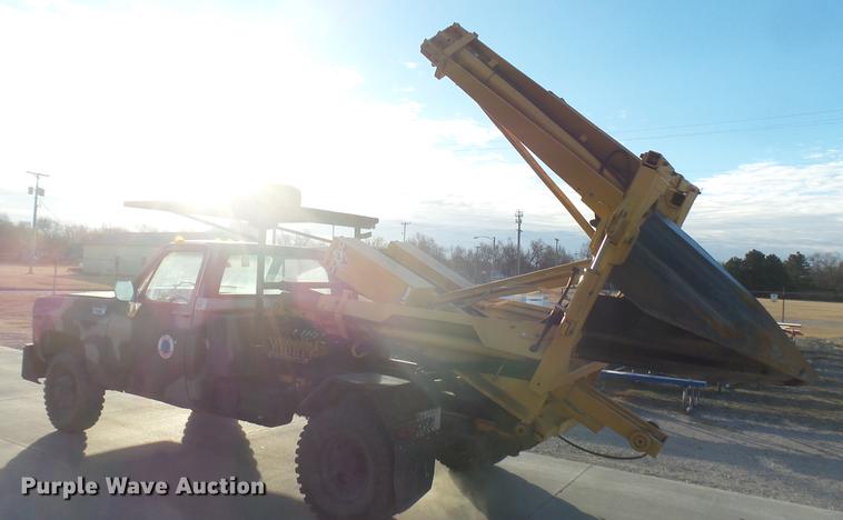 image for item DC1943 1977 Chevrolet 30 pickup truck with tree spade