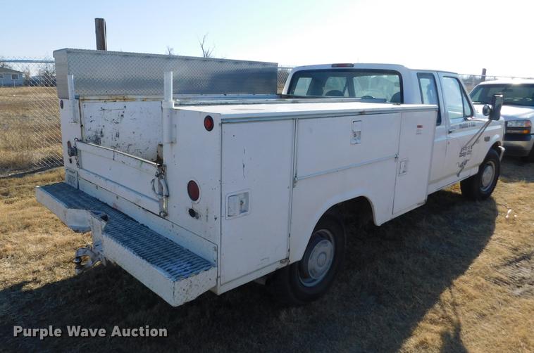 image for item DC8430 1996 Ford F250 XL SuperCab utility bed pickup truck