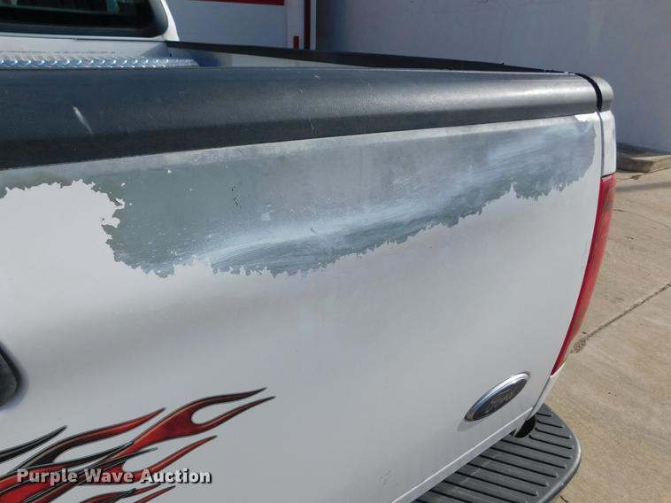 image for item DC8469 1999 Ford F150 XLT SuperCab pickup truck