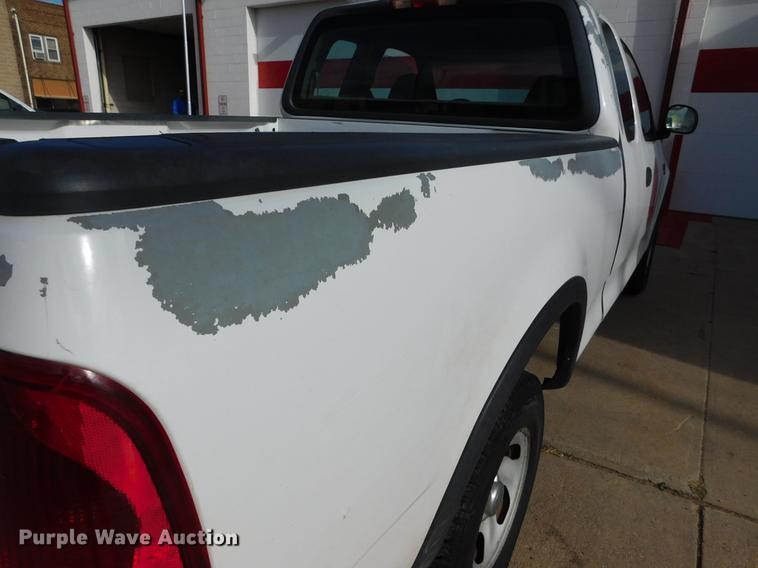 image for item DC8469 1999 Ford F150 XLT SuperCab pickup truck
