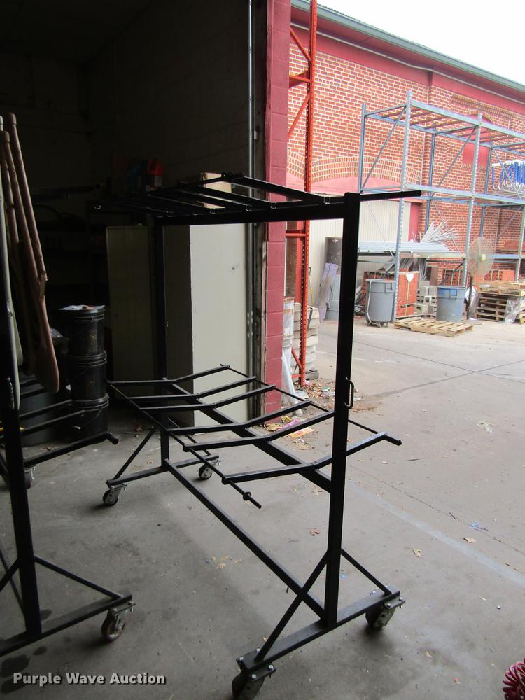 (2) folding chair racks in Leavenworth, KS Item EH9508 sold Purple Wave