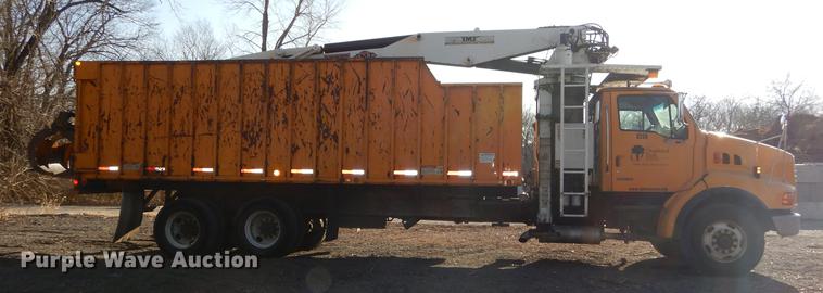 image for item J5564 2002 Sterling L8500 tree grapple truck