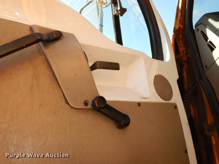 image for item J5564 2002 Sterling L8500 tree grapple truck