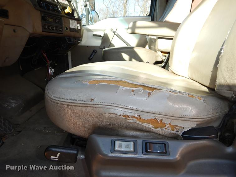 image for item J5564 2002 Sterling L8500 tree grapple truck