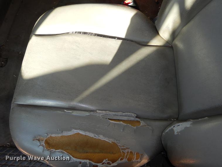 image for item J5564 2002 Sterling L8500 tree grapple truck