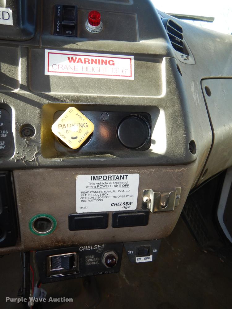 image for item J5564 2002 Sterling L8500 tree grapple truck