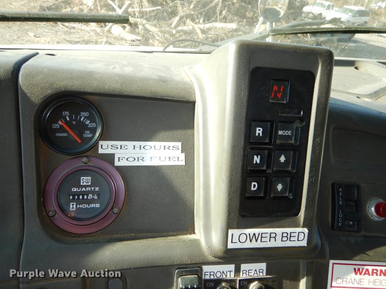 image for item J5564 2002 Sterling L8500 tree grapple truck