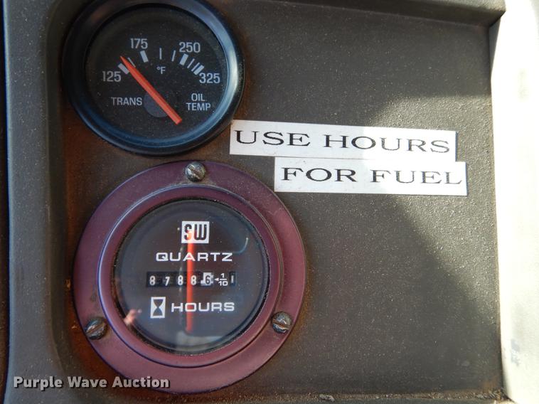 image for item J5564 2002 Sterling L8500 tree grapple truck