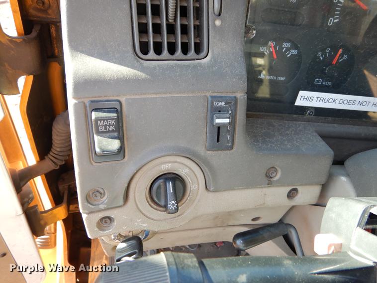 image for item J5564 2002 Sterling L8500 tree grapple truck