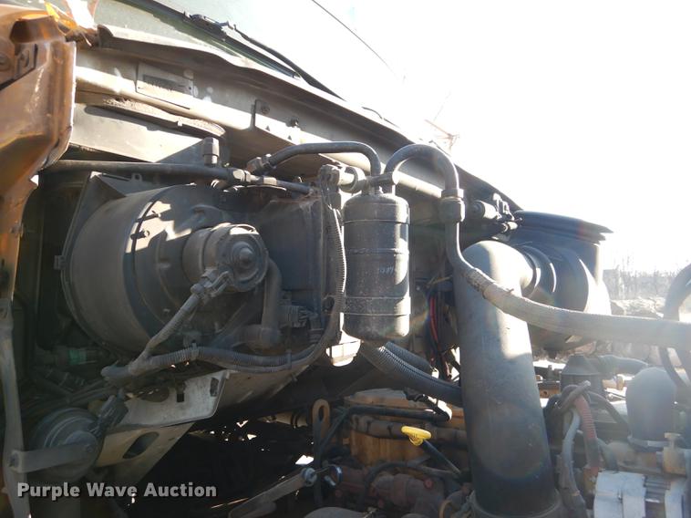 image for item J5564 2002 Sterling L8500 tree grapple truck