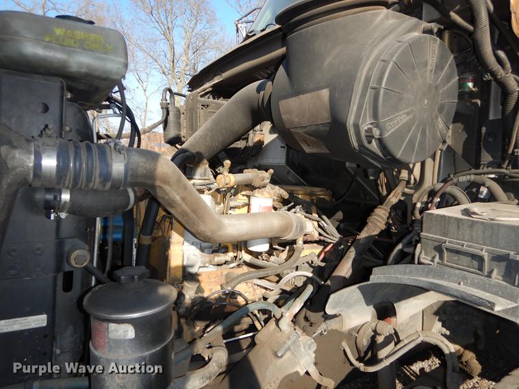 image for item J5564 2002 Sterling L8500 tree grapple truck