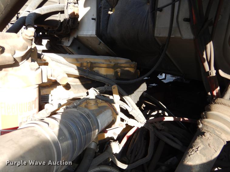 image for item J5564 2002 Sterling L8500 tree grapple truck