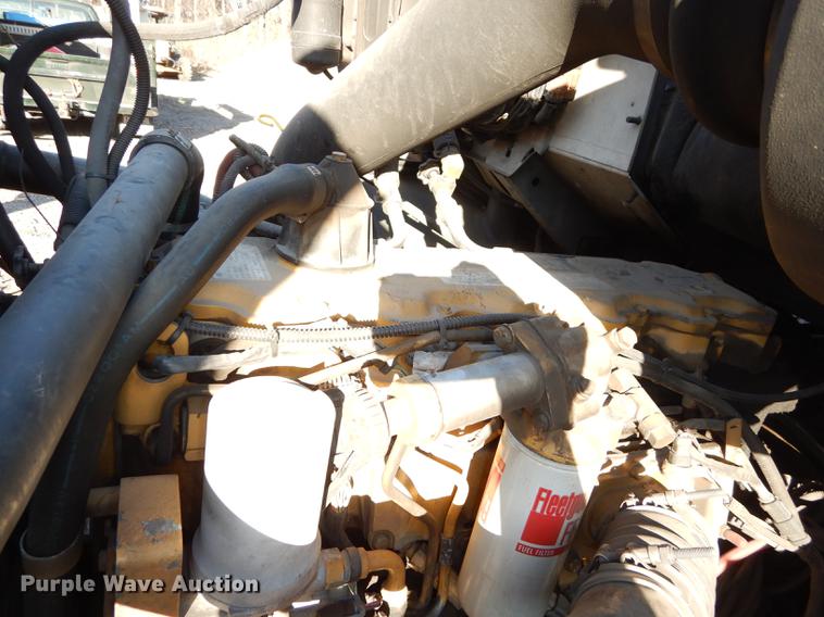 image for item J5564 2002 Sterling L8500 tree grapple truck