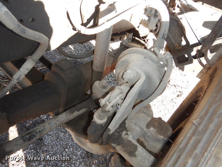 image for item J5564 2002 Sterling L8500 tree grapple truck