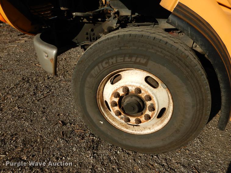 image for item J5564 2002 Sterling L8500 tree grapple truck