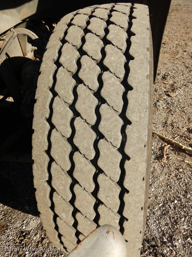 image for item J5564 2002 Sterling L8500 tree grapple truck