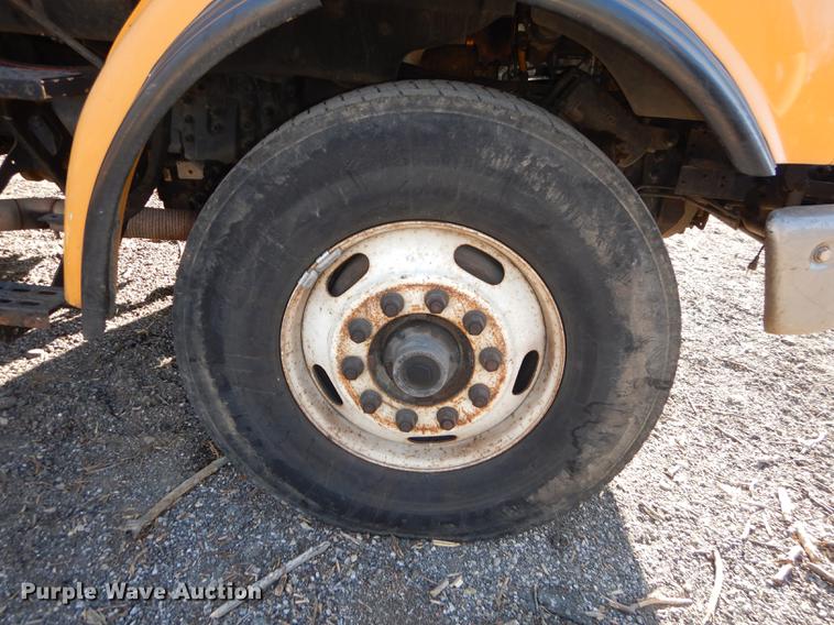 image for item J5564 2002 Sterling L8500 tree grapple truck