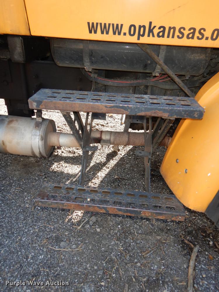 image for item J5564 2002 Sterling L8500 tree grapple truck