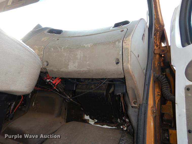 image for item J5564 2002 Sterling L8500 tree grapple truck