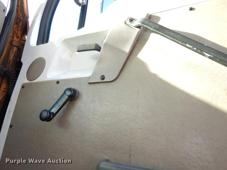 image for item J5564 2002 Sterling L8500 tree grapple truck