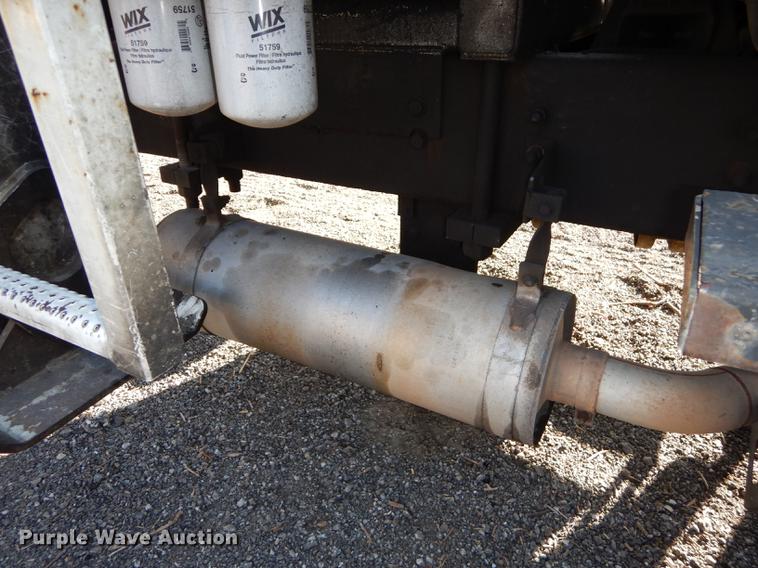 image for item J5564 2002 Sterling L8500 tree grapple truck