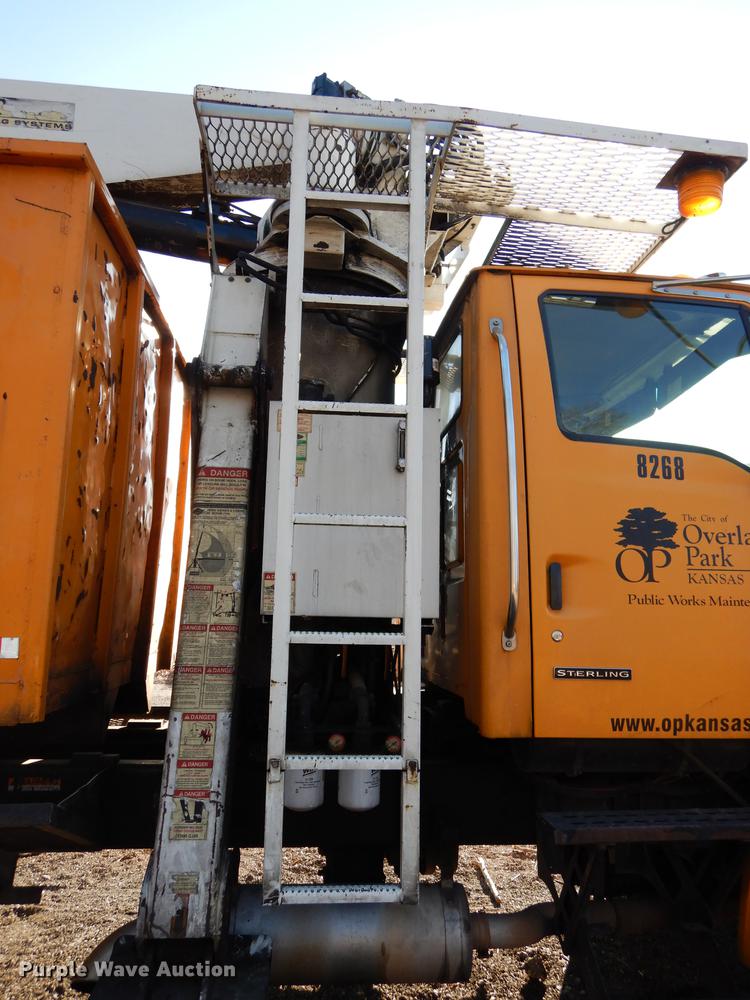 image for item J5564 2002 Sterling L8500 tree grapple truck