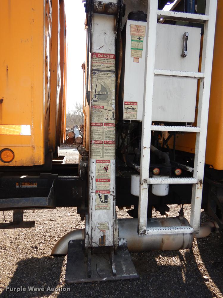 image for item J5564 2002 Sterling L8500 tree grapple truck